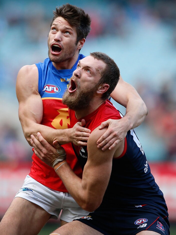 AFL 2015 Rd 16 - Melbourne v Brisbane MELBOURNE, AUSTRALIA - JULY 19 Stefan Martin of the Lions and Max Gawn of the Demons compete in a ruck contest during the 2015 AFL round 16 match between the Melbourne Demons and the Brisbane Lions at the Melbourne Cricket Ground, Melbourne, Australia on July 19, 2015. (Photo by Adam Trafford/AFL Media)